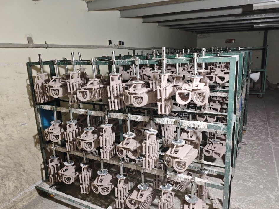 Shells drying on racks before de-wax